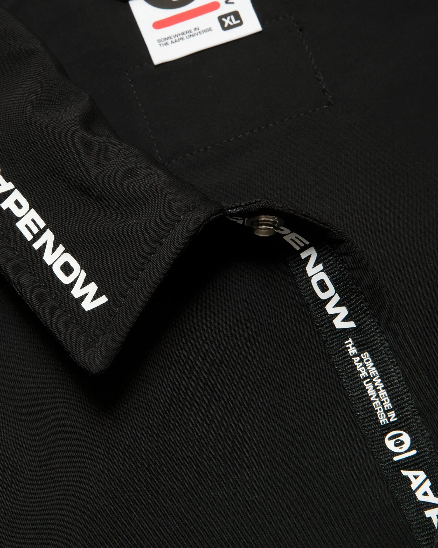 AAPENOW moonface logo coach jacket