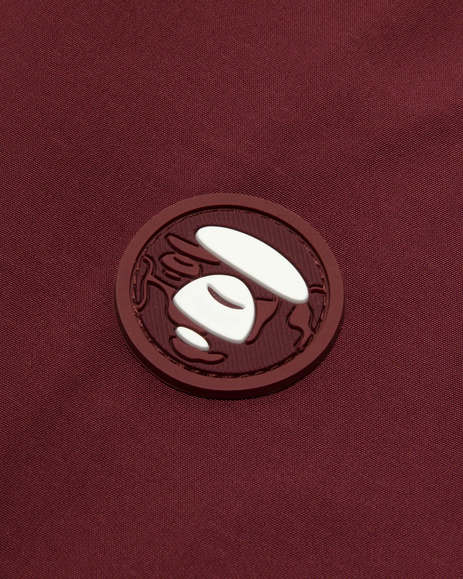 AAPENOW moonface logo coach jacket