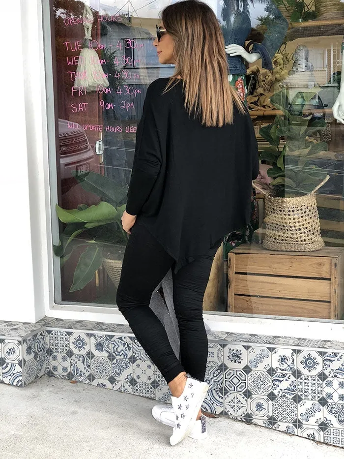 Black Asymetric Top