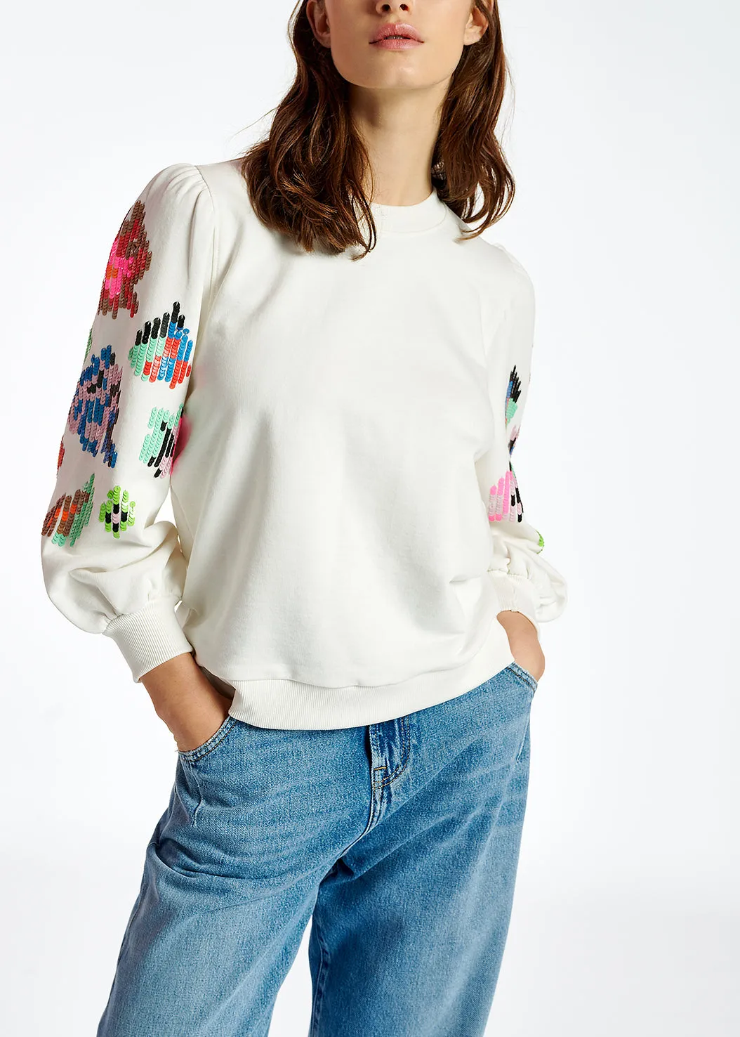 Off-white sweater with multicolor sequin embroideries