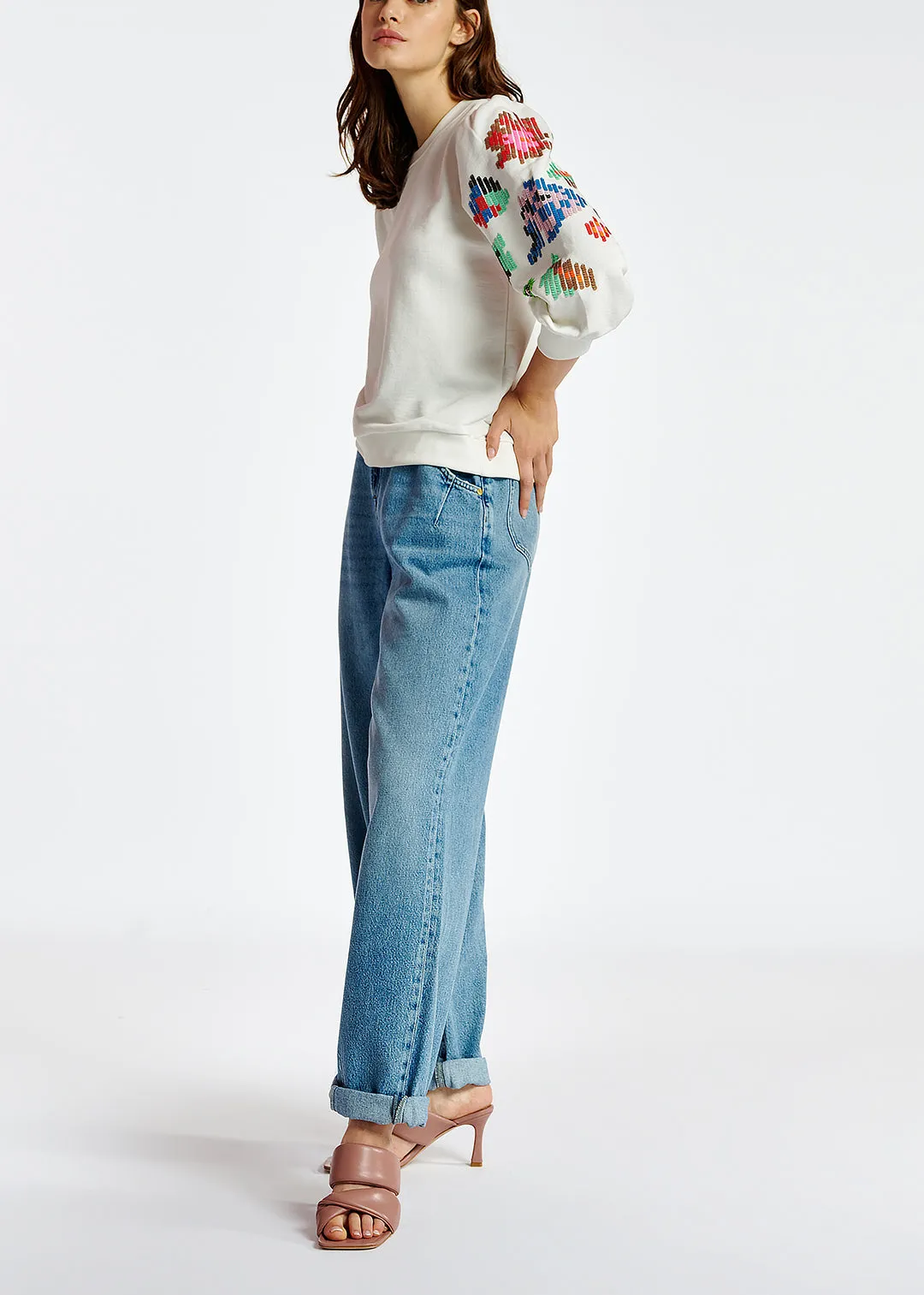 Off-white sweater with multicolor sequin embroideries