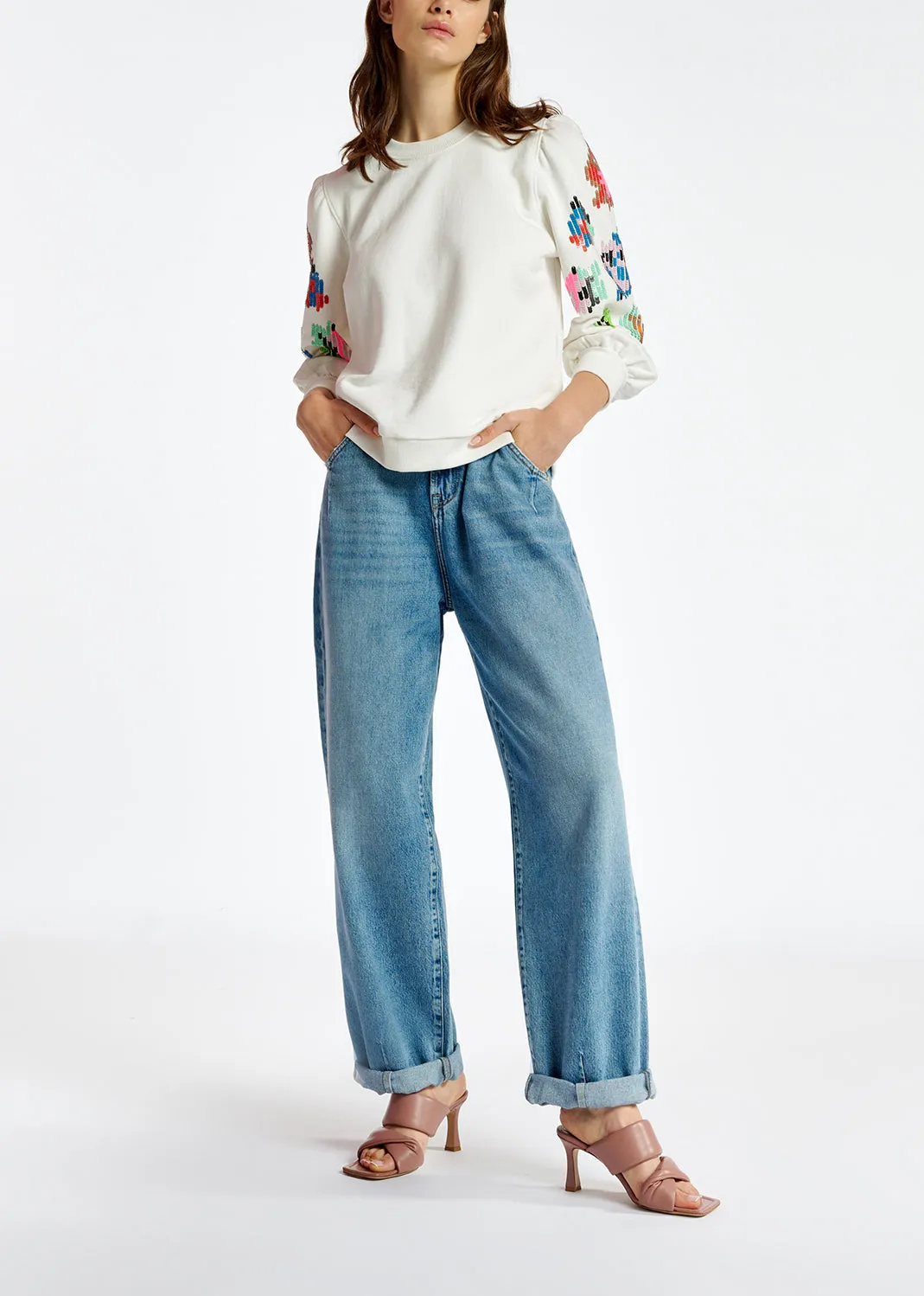 Off-white sweater with multicolor sequin embroideries