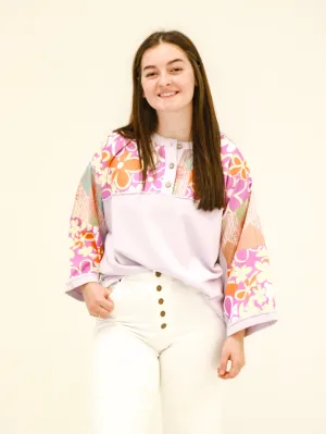 Spring in is the Air Purple Top with Floral Detail